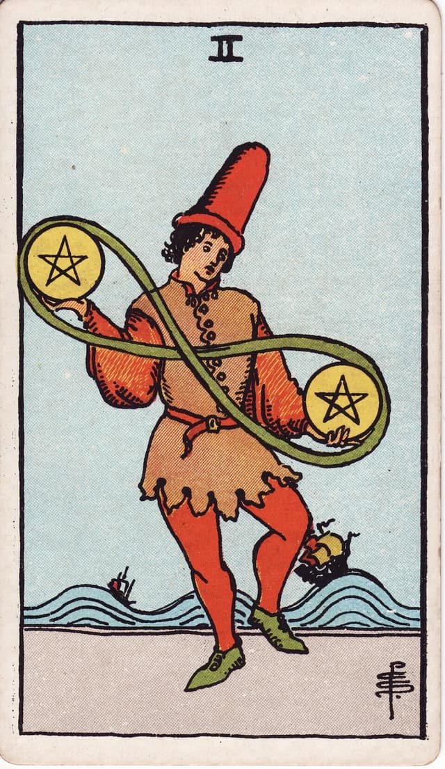 Двойка Пентаклей (Two of Pentacles) — карта Таро